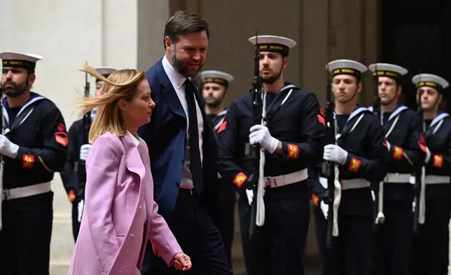 U.S. Vice President JD Vance meets with Italian Prime Minister Giorgia Meloni at Chigi Palace in Rome, Italy, Friday April 18, 2025. (Kenny Holston/The New York Times via AP, Pool)