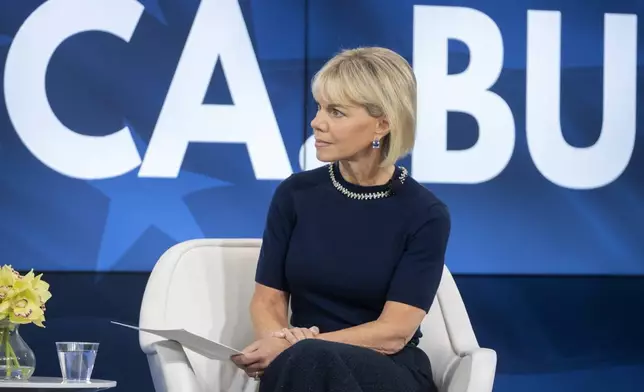 Former television journalist Gretchen Carlson speaks with Michigan Gov. Gretchen Whitmer, not shown, at an event on Wednesday, April 9, 2025, in Washington. (AP Photo/Mark Schiefelbein)