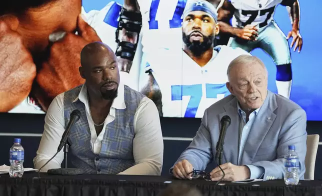 Team owner Jerry Jones, right, speaks during a news conference, accompanied by football player Tyron Smith who announced his retirement from the NFL, at the Dallas Cowboys headquarters in Frisco, Texas, Wednesday, April 16, 2025. (AP Photo/Tony Gutierrez)