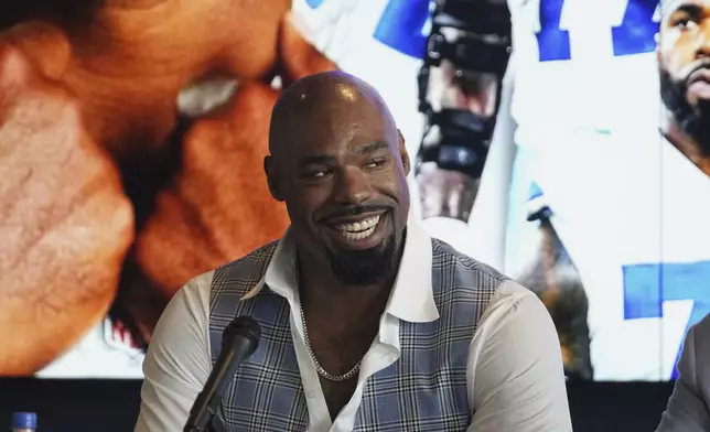 Football player Tyron Smith speaks during a press conference where he announced his retirement from the NFL, at the Dallas Cowboys headquarters in Frisco, Texas, Wednesday, April 16, 2025. (AP Photo/Tony Gutierrez)