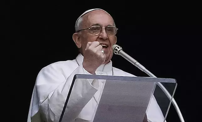 FILE - Pope Francis gestures as he delivers his Angelus prayer from the window of his studio overlooking St. Peter's Square, at the Vatican, Sunday, March 17, 2013. “In these days I’ve been able to read a book by a cardinal -- Cardinal Kasper, a good theologian -- about mercy. And this book has done me a lot of good, though don’t think I’m just doing publicity for my cardinals’ books! It’s not like that. But it’s done me so much good. Cardinal Kasper said that feeling mercy, this word changes everything. It’s the best thing we can feel: It changes the world. A bit of mercy makes the world less cold and more just.” (AP Photo/Gregorio Borgia, File)