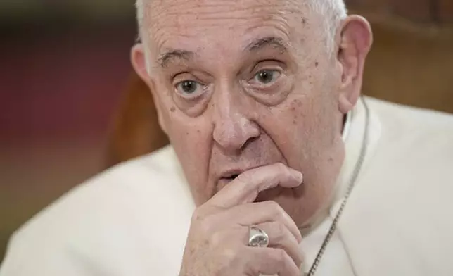 FILE - Pope Francis speaks during an interview with The Associated Press at the Vatican, Tuesday, Jan. 24, 2023. Francis acknowledged that Catholic bishops in some parts of the world support laws that criminalize homosexuality or discriminate against the LGBTQ community, and he himself referred to homosexuality in terms of "sin." (AP Photo/Andrew Medichini, File)