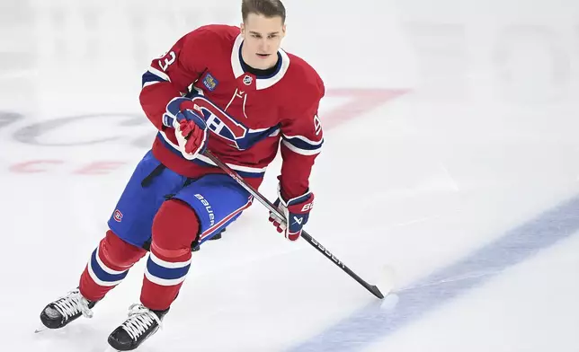 Montreal Canadiens' Ivan Demidov skates prior to an NHL hockey game against the Chicago Blackhawks in Montreal, Monday, April 14, 2025. (Graham Hughes/The Canadian Press via AP)