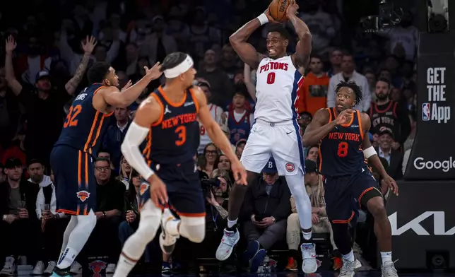 Detroit Pistons center Jalen Duren (0) catches a rebound during the second half of Game 2 of an NBA basketball first-round playoff series against the New York Knicks, Monday, April 21, 2025, in New York. (AP Photo/Angelina Katsanis)