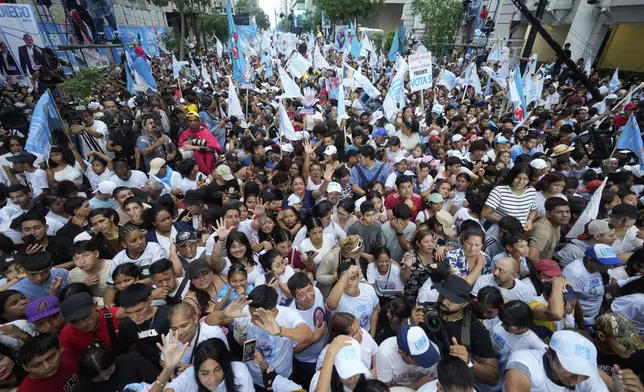 Supporters of Luisa Gonzalez, presidential candidate for the Citizen Revolution party, attend a campaign event in Guayaquil, Ecuador, Thursday, April 10, 2025. (AP Photo/Fernando Vergara)