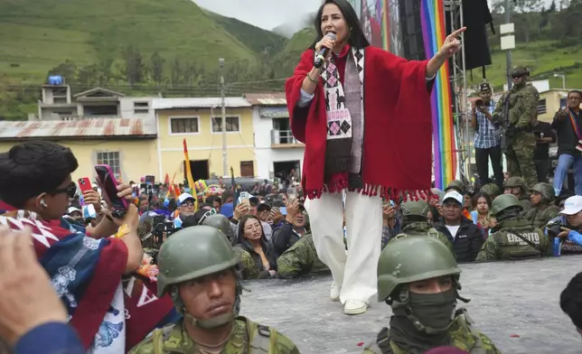 Presidential candidate Luisa Gonzalez gives a speech at a rally after receiving support from Indigenous organizations during a rally in Tixan, Ecuador, Sunday, March 30, 2025. (AP Photo/Dolores Ochoa)
