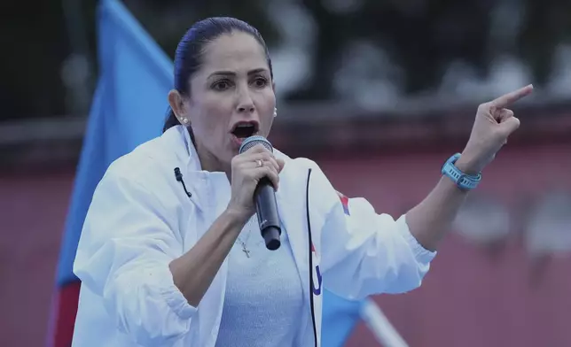 Luisa Gonzalez, presidential candidate for the Citizen Revolution party, gives a speech at a campaign rally in Quito, Ecuador, Wednesday, April 9, 2025. (AP Photo/Dolores Ochoa)