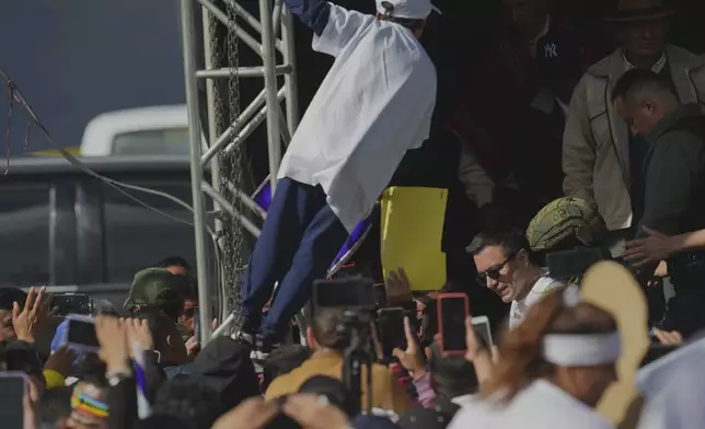 Ecuador's President Daniel Noboa, who is running for re-election, campaigns in Pelileo, Ecuador, Wednesday, April 2, 2025. (AP Photo/Dolores Ochoa)