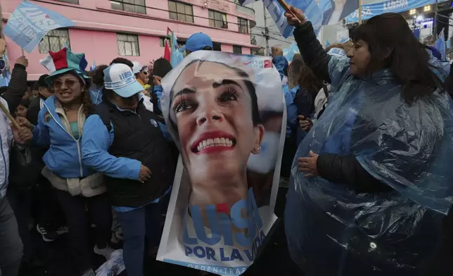 Supporters of Luisa Gonzalez, presidential candidate for the Citizen Revolution party, attend a campaign rally in Quito, Ecuador, Wednesday, April 9, 2025. (AP Photo/Dolores Ochoa)