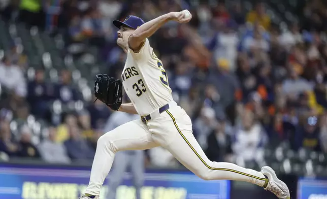 Milwaukee Brewers pitcher Tyler Alexander throws to the Detroit Tigers during the first inning of a baseball game Monday, April 14, 2025, in Milwaukee. (AP Photo/Jeffrey Phelps)
