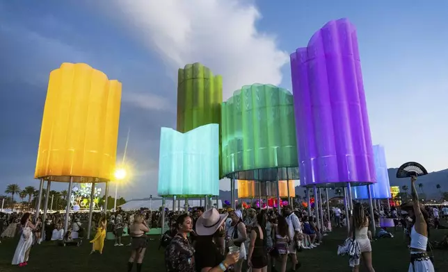 Festivalgoers are seen during the first weekend of the Coachella Valley Music and Arts Festival at the Empire Polo Club on Friday, April 11, 2025, in Indio, Calif. (Photo by Amy Harris/Invision/AP)