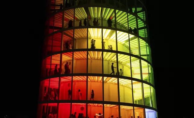 Festivalgoers are seen during the first weekend of the Coachella Valley Music and Arts Festival at the Empire Polo Club on Friday, April 11, 2025, in Indio, Calif. (Photo by Amy Harris/Invision/AP)