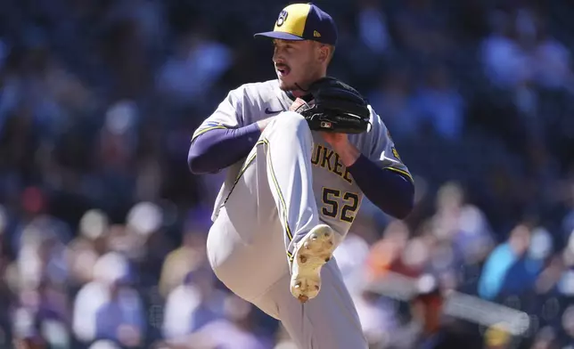 Milwaukee Brewers relief pitcher Bryan Hudson works against the Colorado Rockies in the sixth inning of a baseball game Thursday, April 10, 2025, in Denver. (AP Photo/David Zalubowski)