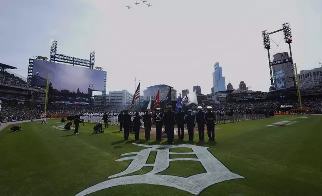 A-10 Thunderbolt II "Warthog" aircraft flyover Comerica Park before a baseball game between the Detroit Tigers and Chicago White Sox, Friday, April 4, 2025, in Detroit. (AP Photo/Paul Sancya)