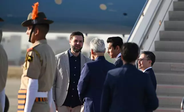 U.S. Vice President JD Vance, second left, departs Jaipur, India en route to Joint Base Andrews, Md., Thursday, April 24, 2025. (Kenny Holston/The New York Times via AP, Pool)