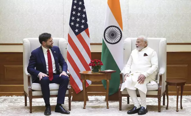 U.S. Vice President JD Vance talks with Indian Prime Minister Narendra Modi during a meeting in New Delhi, India, Monday, April 21, 2025. (Indian Prime Minister's Office via AP)