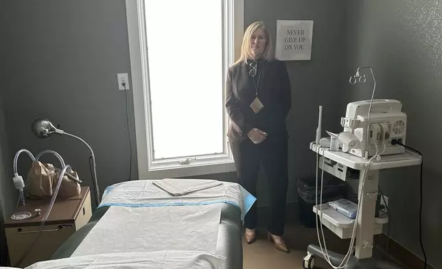 Julie Burkhart, founder and president of Wellspring Health Access, Wyoming's only abortion clinic, is seen in a procedure room in the clinic Tuesday, April 8, 2025, in Casper, Wyo. (AP Photo/Mead Gruver)