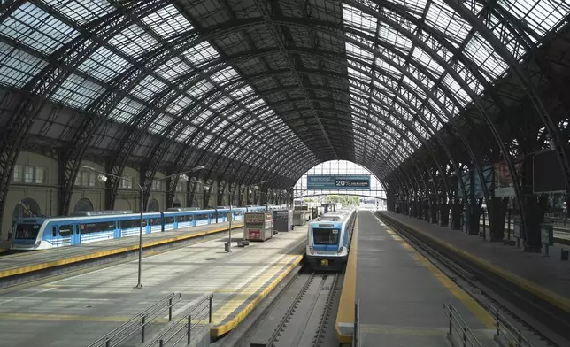 The Retiro train station is empty due to a general strike against the austerity measures of President Javier Milei in Buenos Aires, Argentina, Thursday, April 10, 2025. (AP Photo/Rodrigo Abd)