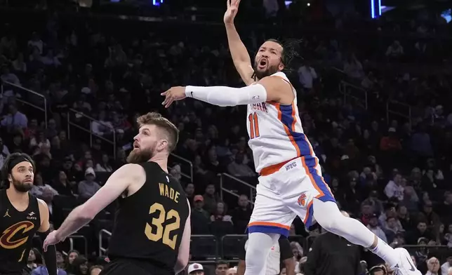 New York Knicks' Jalen Brunson (11) losses the ball as he drives to the basket during the second half of an NBA basketball game against the Cleveland Cavaliers Friday, April 11, 2025, in New York. (AP Photo/Seth Wenig)