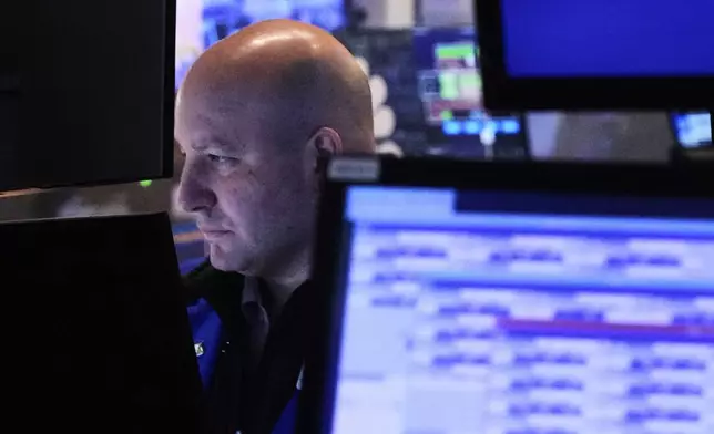 Specialist John Parisi works at his post on the floor of the New York Stock Exchange, Thursday, April 24, 2025. (AP Photo/Richard Drew)