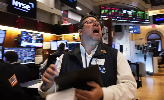 Trader Michael Capolino works on the floor of the New York Stock Exchange, Thursday, April 24, 2025. (AP Photo/Richard Drew)