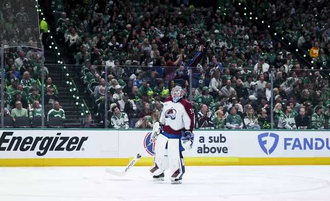 Colorado Avalanche goaltender Mackenzie Blackwood (39) skates to the goal during a media timeout during a first-round NHL hockey playoff game against the Dallas Stars in Dallas, Saturday, April 19, 2025. (AP Photo/Gareth Patterson)