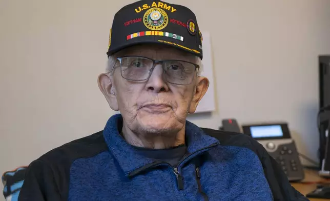 George Bennett sits at his desk on the SEARHC campus in Sitka, Alaska, Monday, April 28, 2025. (James Poulson/The Daily Sitka Sentinel via AP)