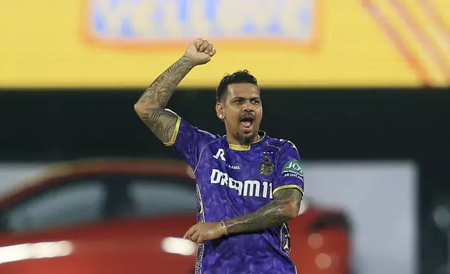 Kolkata Knight Riders' Sunil Narine celebrates the dismissal of Chennai Super Kings' captain Mahendra Singh Dhoni during the Indian Premier League cricket match between Chennai Super Kings and Kolkata Knight Riders at M. A. Chidambaram Stadium in Chennai, India, Friday, April 11, 2025. (AP Photo/R. Parthibhan)