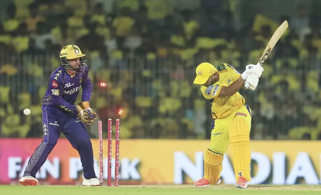 Chennai Super Kings' Rahul Tripathi bowled out by Kolkata Knight Riders' Sunil Narine during the Indian Premier League cricket match between Chennai Super Kings and Kolkata Knight Riders at M. A. Chidambaram Stadium in Chennai, India, Friday, April 11, 2025. (AP Photo/R. Parthibhan)