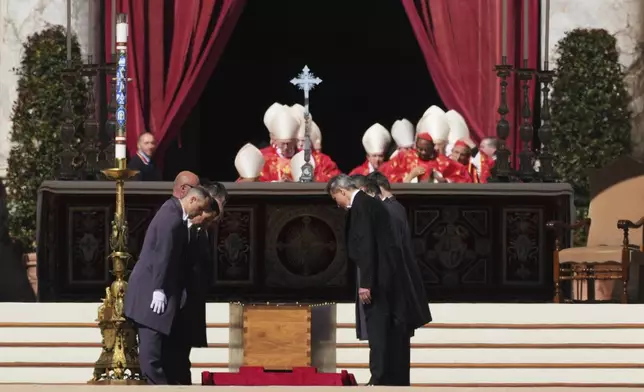 The coffin of Pope Francis is placed on the ground in St Peter's Square for his funeral, at the Vatican, Saturday, April 26, 2025. (AP Photo/Andrew Medichini)