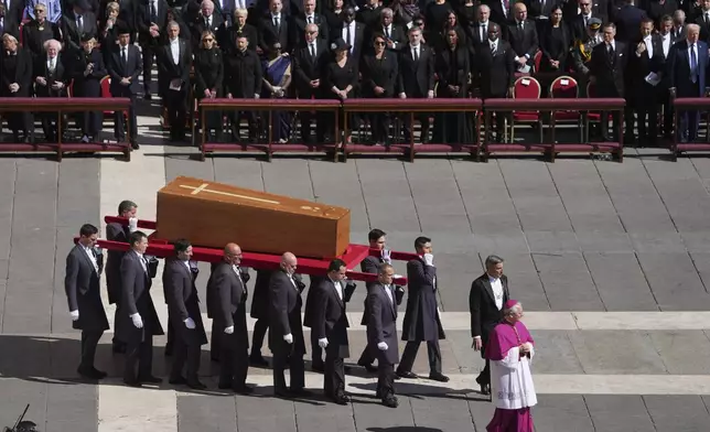 The coffin of Pope Francis is carried into St Peter's Square for his funeral, at the Vatican, Saturday, April 26, 2025. (AP Photo/Evan Vucci)