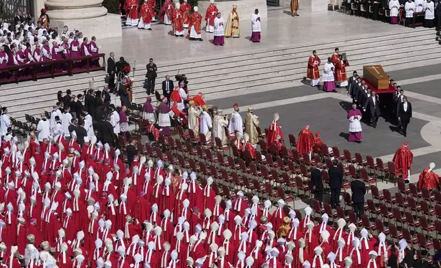 The coffin of Pope Francis is carried into St Peter's Square for his funeral, at the Vatican, Saturday, April 26, 2025. (AP Photo/Gregorio Borgia)