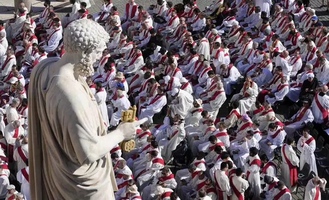 Clergy take their seats for the funeral of Pope Francis in St. Peter's Square at the Vatican, Saturday, April 26, 2025. (AP Photo/Markus Schreiber)