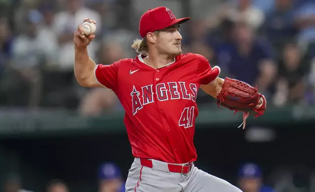 Los Angeles Angels starting pitcher Jack Kochanowicz throws a pitch to the Texas Rangers during the second inning of a baseball game Thursday, April 17, 2025, in Arlington, Texas. (AP Photo/Julio Cortez)