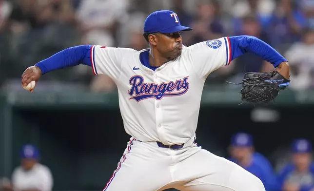 Texas Rangers starting pitcher Kumar Rocker throws a pitch to the Los Angeles Angels during the fifth inning of a baseball game Thursday, April 17, 2025, in Arlington, Texas. (AP Photo/Julio Cortez)