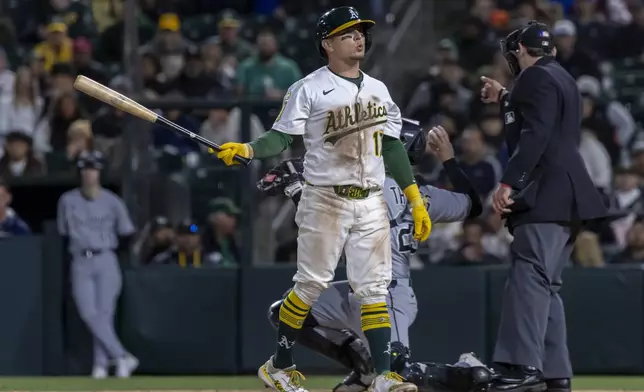 Athletics' Luis Urías (17) reacts after a strike during the seventh inning of a baseball game against the Chicago White Sox Friday, April 25, 2025, in West Sacramento, Calif. (AP Photo/Sara Nevis)