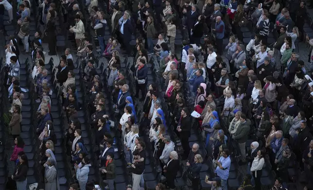 Faithful gather for a rosary prayer for the late Pope Francis, in St. Peter's Square at the Vatican, Monday April 21, 2025 (AP Photo/Andrew Medichini)