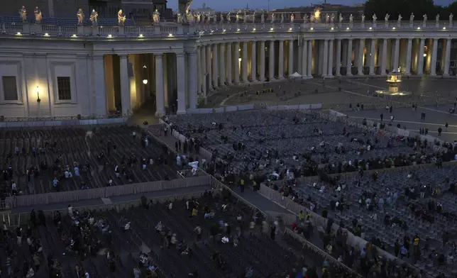 Faithful leave after a rosary prayer for the late Pope Francis, in St. Peter's Square at the Vatican, Monday April 21, 2025. (AP Photo/Andrew Medichini)