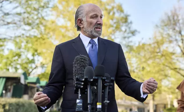 Commerce Secretary Howard Lutnick speaks to reporters outside the West Wing of the White House, Wednesday, April 9, 2025, in Washington. (AP Photo/Jacquelyn Martin)