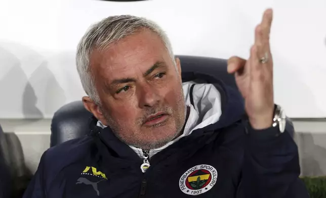 Fenerbahce's coach Jose Mourinho gestures prior to the Turkish Cup quarterfinals soccer match between Fenerbahce and Galatasaray at the Ulker stadium, in Istanbul, Wednesday, April 2, 2025. (Huseyin Yavuz/Dia Photo via AP)