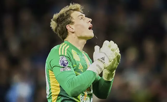 Leicester's goalkeeper Mads Hermansen reacts after receiving a second goal during the English Premier League soccer match between Manchester City and Leicester City at the Etihad stadium in Manchester, England, Wednesday, April 2, 2025. (AP Photo/Dave Thompson)