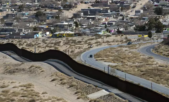 FILE - The Anapra neighborhood of Ciudad Juarez, Mexico, is seen behind the border wall in Sunland Park, N.M., Monday, Feb. 3, 2025. (AP Photo/Andres Leighton, File)