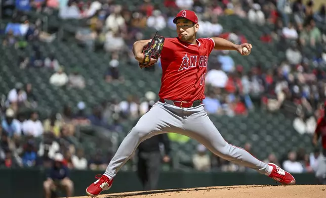 Los Angeles Angels pitcher Yusei Kikuchi throws against the Minnesota Twins during the first inning of a baseball game, Saturday, April 26, 2025, in Minneapolis. (AP Photo/Craig Lassig)