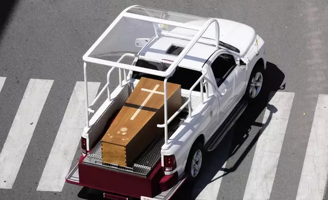 The coffin of Pope Francis makes its way to St. Mary Major Basilica in Rome, Saturday, April 26, 2025. (AP Photo/Luca Bruno)