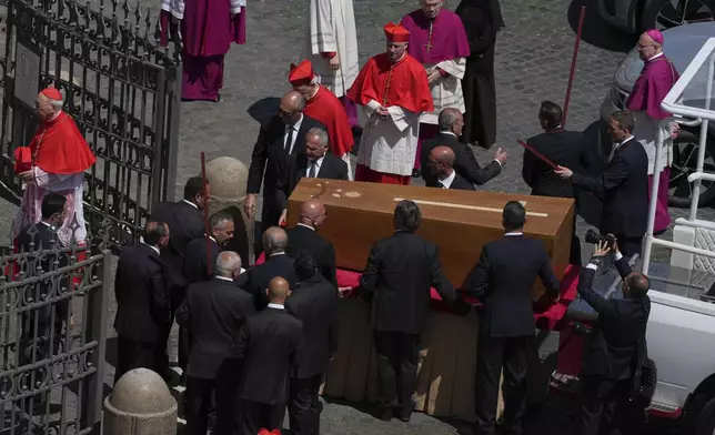 The coffin of Pope Francis arrives for his burial ceremony at St. Mary Major Basilica in Rome, Saturday, April 26, 2025. (AP Photo/Antonietta Baldassarre)