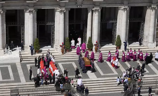 The coffin of Pope Francis is carried into St. Mary Major Basilica in Rome, Saturday, April 26, 2025. (AP Photo/Luca Bruno)