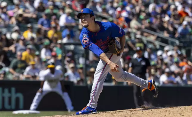 New York Mets pitcher Kodai Senga (34) throws to the Athletics during the seventh inning of a baseball game Sunday, April 13, 2025, in West Sacramento, Calif. (AP Photo/Sara Nevis)
