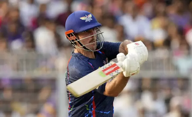 Lucknow Super Giants' Mitchell Marsh plays a shot during the Indian Premier League cricket match between Kolkata Knight Riders and Lucknow Super Giants at Eden Gardens in Kolkata, India, Tuesday, April 8, 2025. (AP Photo/Bikas Das)