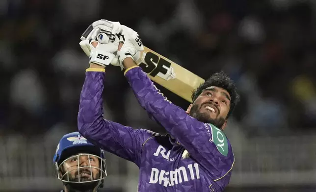 Kolkata Knight Riders' Venkatesh Iyer plays a shot during the Indian Premier League cricket match between Kolkata Knight Riders and Lucknow Super Giants at Eden Gardens in Kolkata, India, Tuesday, April 8, 2025. (AP Photo/Bikas Das)