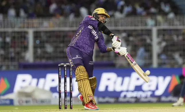 Kolkata Knight Riders' Sunil Narine plays a shot during the Indian Premier League cricket match between Kolkata Knight Riders and Lucknow Super Giants at Eden Gardens in Kolkata, India, Tuesday, April 8, 2025. (AP Photo/Bikas Das)
